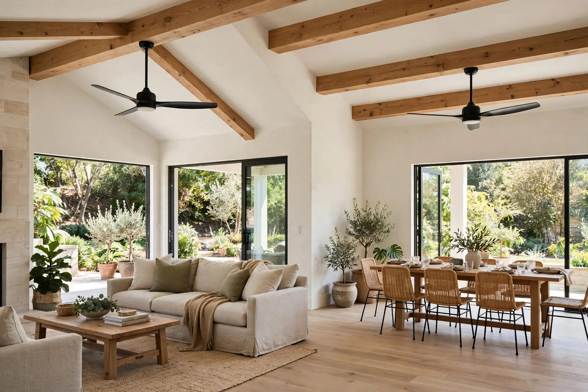 Ceiling Fan Size: How to Pick One That Actually Moves Air 4 Great room with two ceiling fans spaced over the living and dining areas, two ceiling fans for a big room